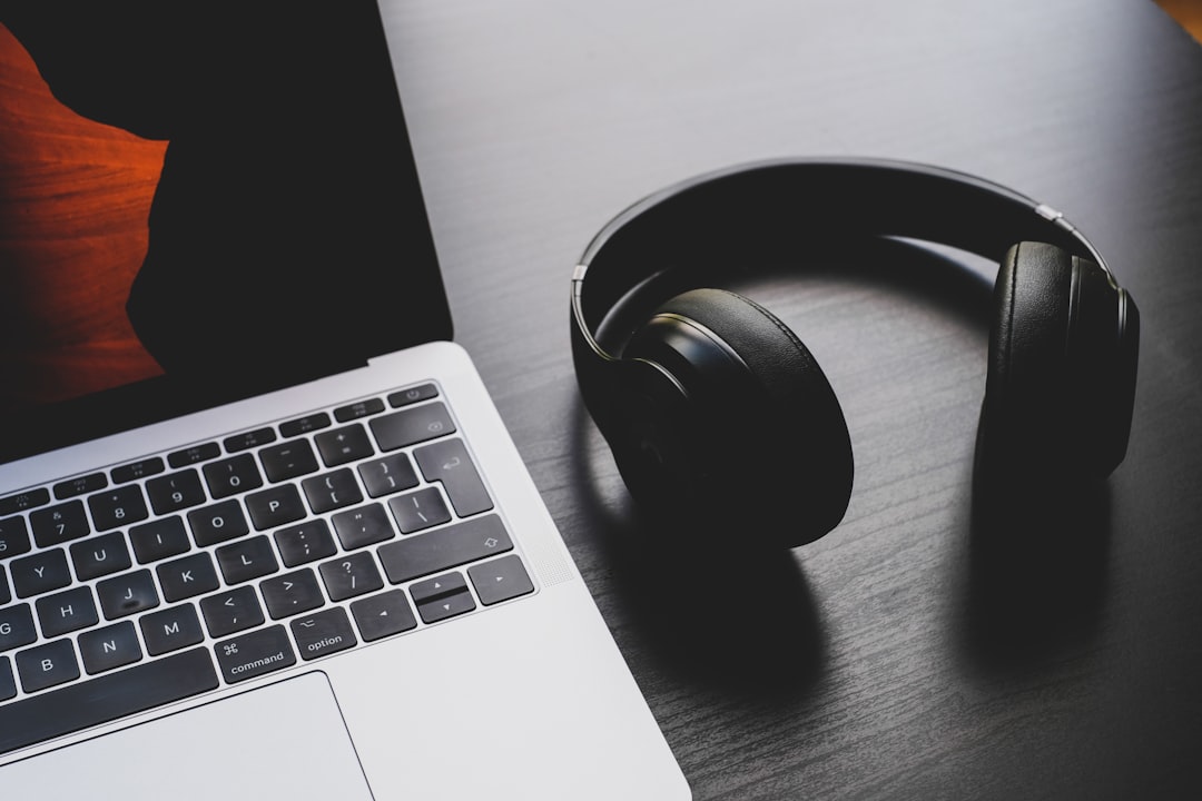 Headphones and laptop for modern music promotion